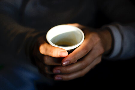 Girl holding coffee espresso photo