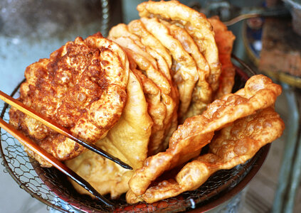 traditional chinese food sold at a food stall photo