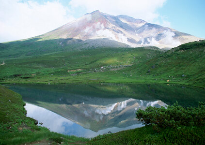 Mountain lake in background with high mountain photo