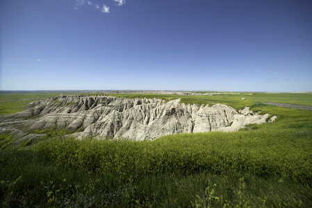 The Edge of a cliff at Badlands National Park photo