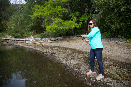 Woman fishing for salmon
