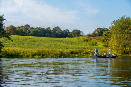 Group fly fishing from drift boat on White River photo