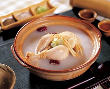 Traditional korea food-Ginseng chicken soup photo