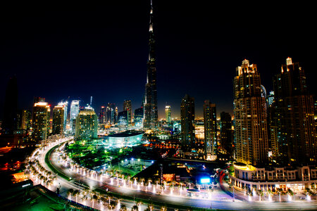 Dubai cityscape at night with Burj Khalifa in center in the United Arab Emirates - UAE photo