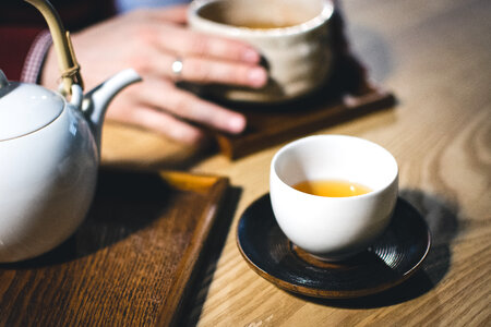 Meeting with a friend over a cup of green tea photo