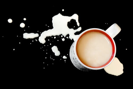 Tea Cup and Splashed Milk photo