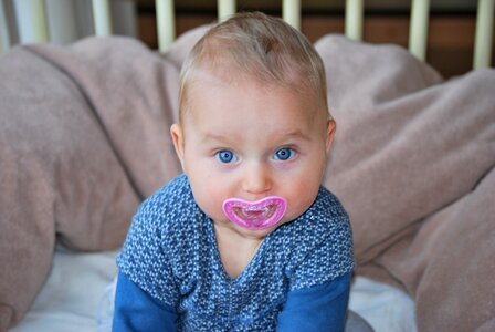 People pacifier blue eyes photo