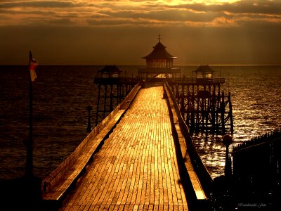 Dock structure sunset photo