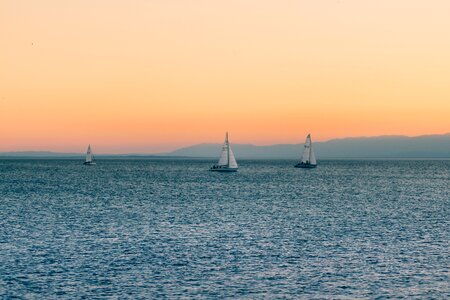 Sailboats on Water Sunset photo