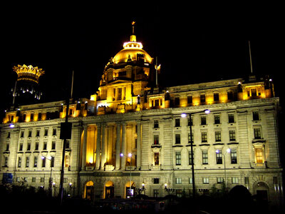 HSBC Building lighted up at night in Shanghai, China photo