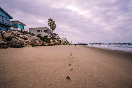 Footprints rocks shore