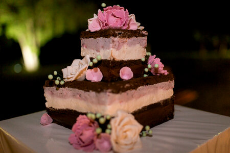 Wedding Cake Decorated with Comestible Flowers photo