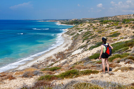 Young Lady looking at the distance on the shore