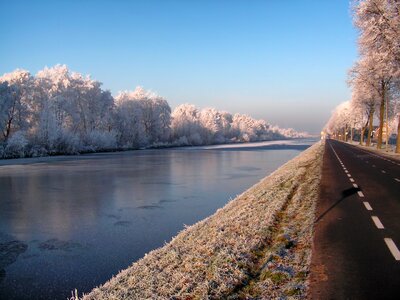 winter snow covered road in the netherlands