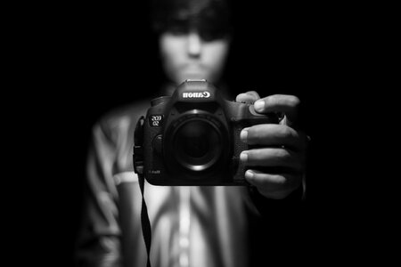 A Mirror Selfportrait of a Man Holding a Camera photo