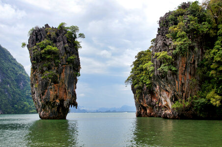 Rock Structure Rising out of the Sea in Thailand photo