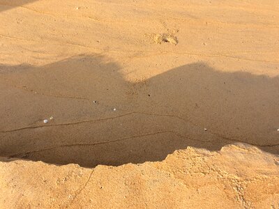 Beach sand shadow