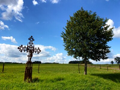 Tree cross sculpture photo