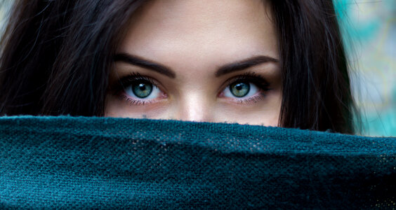 Portrait of Young Brunette Woman with Green Eyes photo