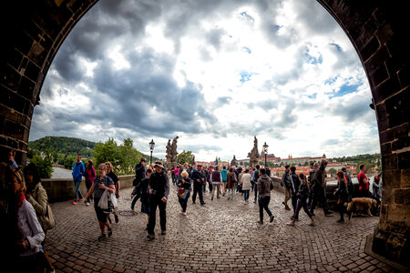 Crowd of people on Charles Bridge, a UNESCO World Heritage Site