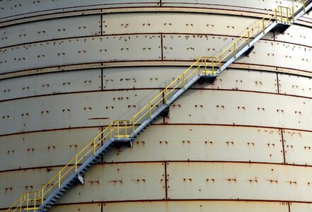 The Side of a Huge Storage Tank, With an Access Stairway photo