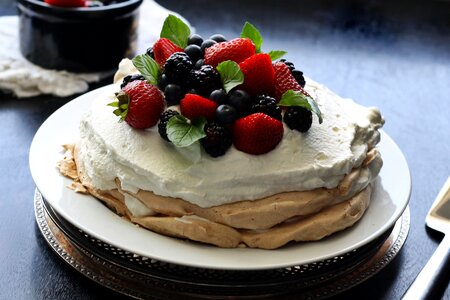 Delicious Fruit Pavlova Dessert with Strawberries photo