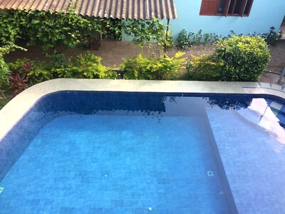 Cityscape trees swimming pool photo