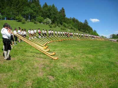 alphorns, traditional folk music instrument - switzerland photo