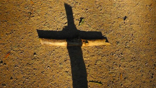 Christian wooden cross shadow photo