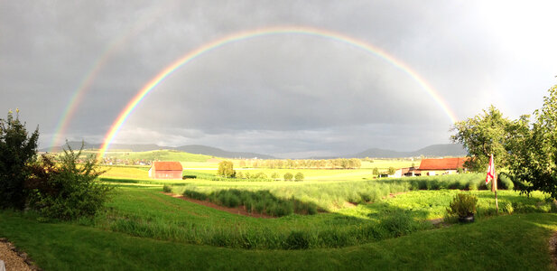 Rainbow Arcing over the Sky and Farms photo