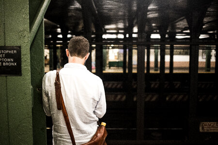 Back of a Man Waiting at the Station photo