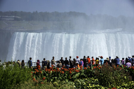 People looking at Niagara Falls in Ontario, Canada photo