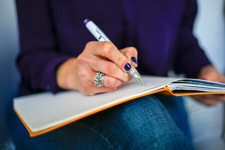 Woman Writing Notebook photo