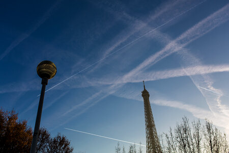 Traces of Planes over Eiffel Tower, Paris, France photo
