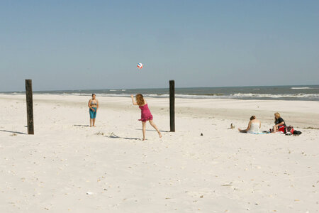 People enjoying a day at the beach photo