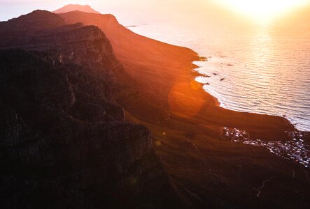 Sunset ocean cliff photo