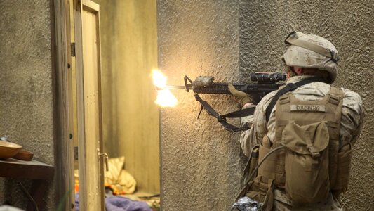 Marine fires at a simulated enemy photo