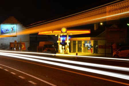 Slow shutter speed traffic gas and service station photo