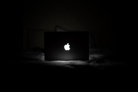 B&W MacBook Glowing Apple Logo photo