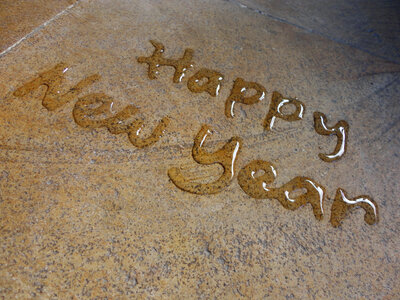 Happy new year water calligraphy photo