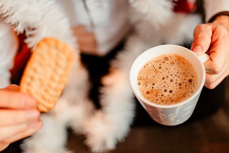 Cozy atmosphere with hot chocolate and biscuits photo