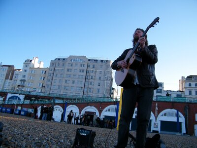 Guitar beach performer photo