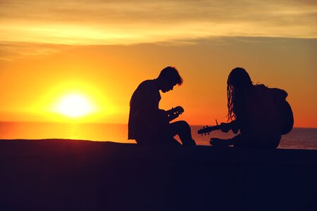 Woman Man Silhouette Guitar photo