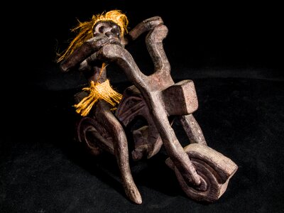 Wild hairstyle wood model art from thailand