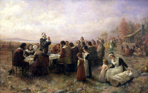 First Thanksgiving at Plymouth , Massachusetts between Pilgrims and Indians photo