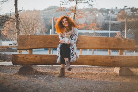Red Hair Woman Bench photo