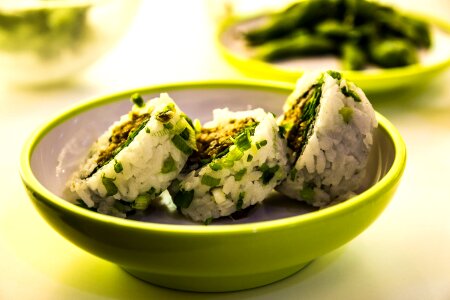 healthy kale and avocado sushi roll with bowl photo