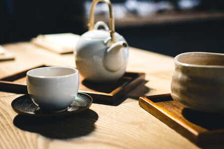 Tea cup and tea pot photo