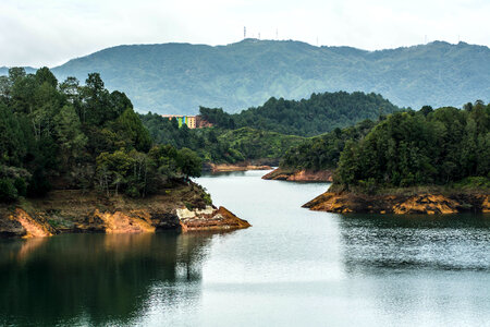 Landscape with river and forest in Guatape, Colombia photo