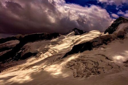 Heavy Clouds over the Swiss Alps photo